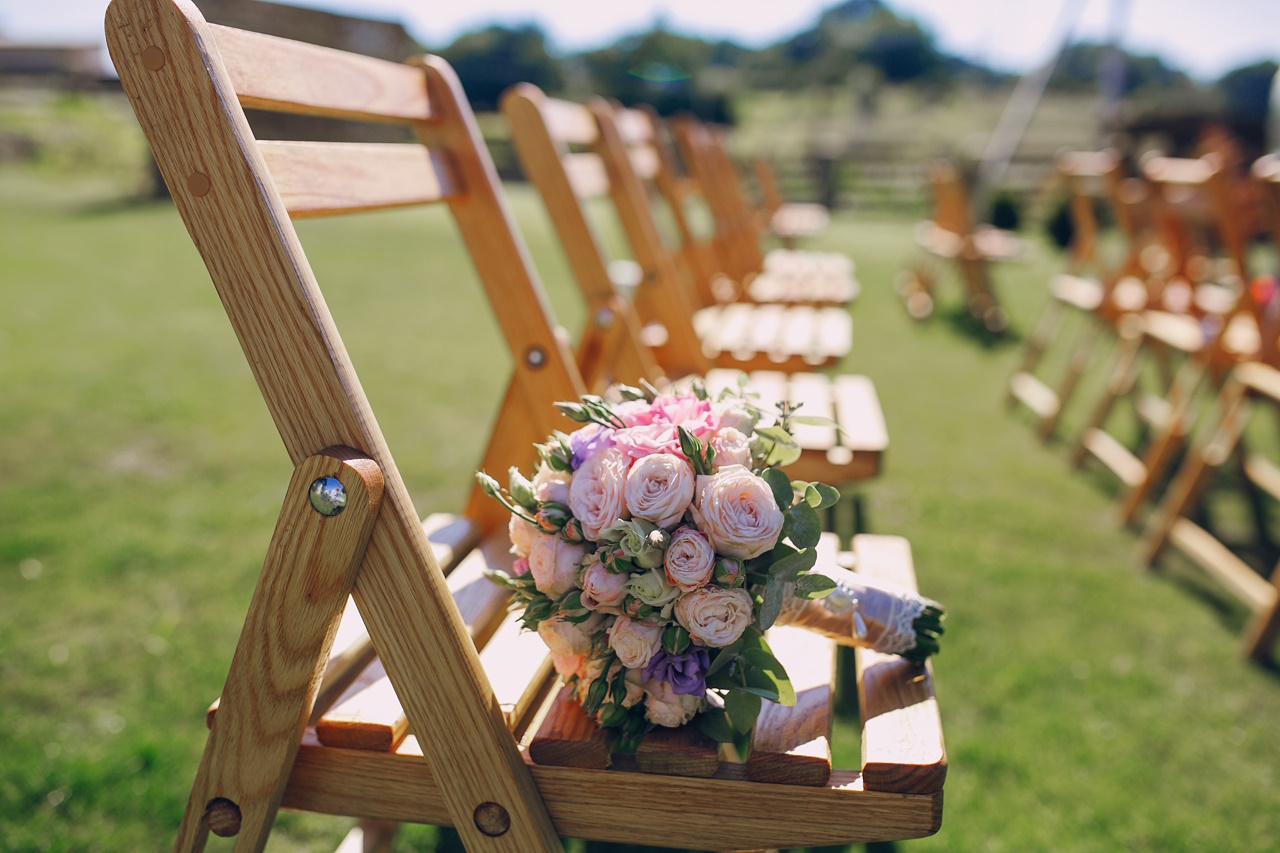 Beautiful wedding decorations for the ceremony outside in sunny weather